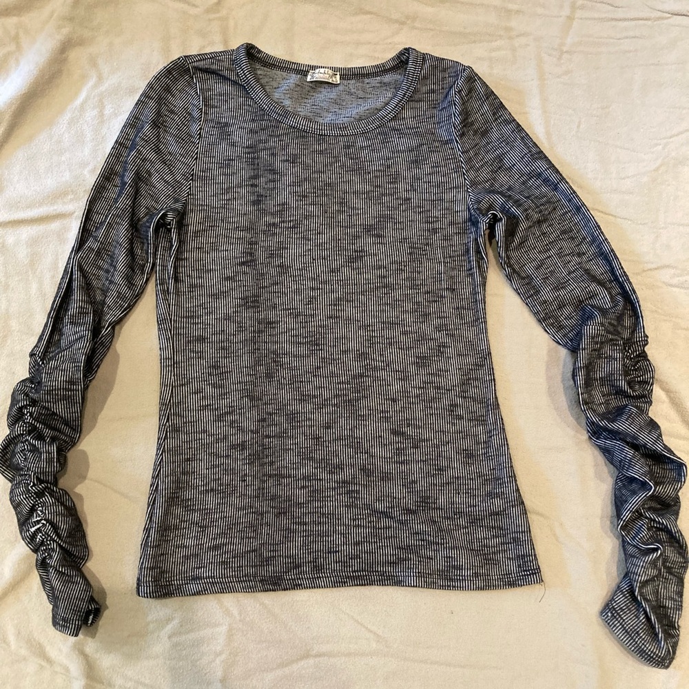 Long sleeve with fun details! Intimately by free people.